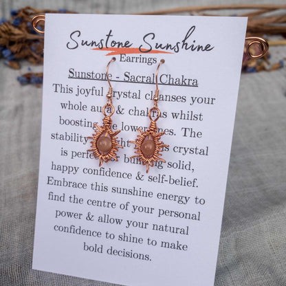 sunburst wire woven wrapped earrings with sunstone beads  on information card
