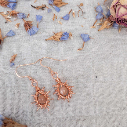 sunburst wire woven wrapped earrings with sunstone beads 