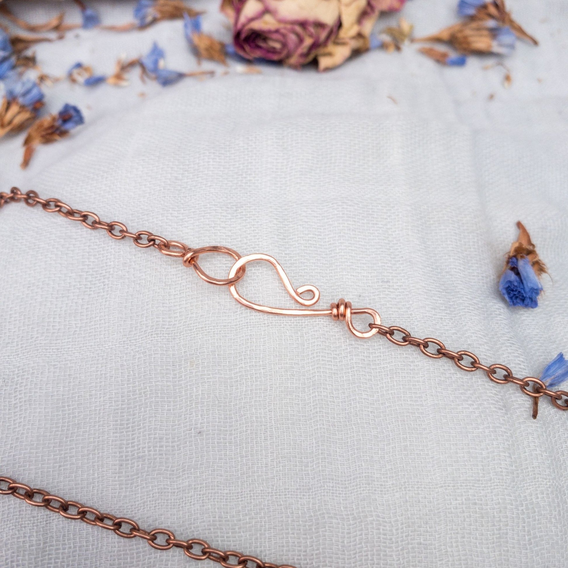 hand made clasp on antiqued copper chain