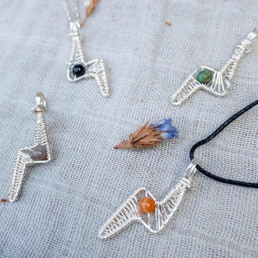 four silver hand woven lightning bolt fidget necklaces with labradorite, black agate, African Turquoise and carnelian beads