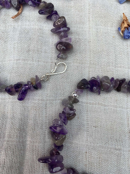 Amethyst bracelet one stretch cord one memory wire with silver handmade clasp close up