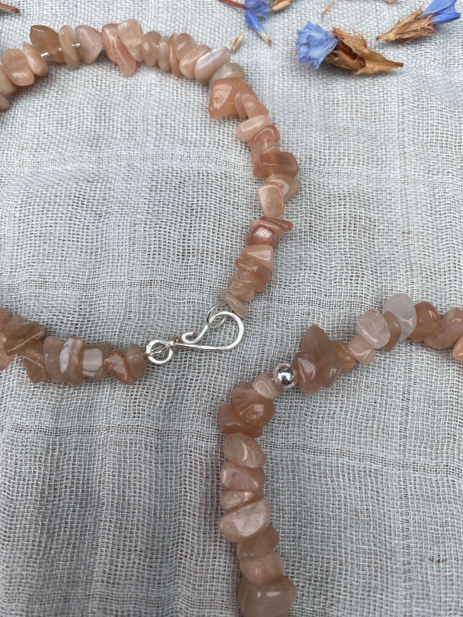 sunstone bracelet one stretch cord one memory wire with silver handmade clasp close up