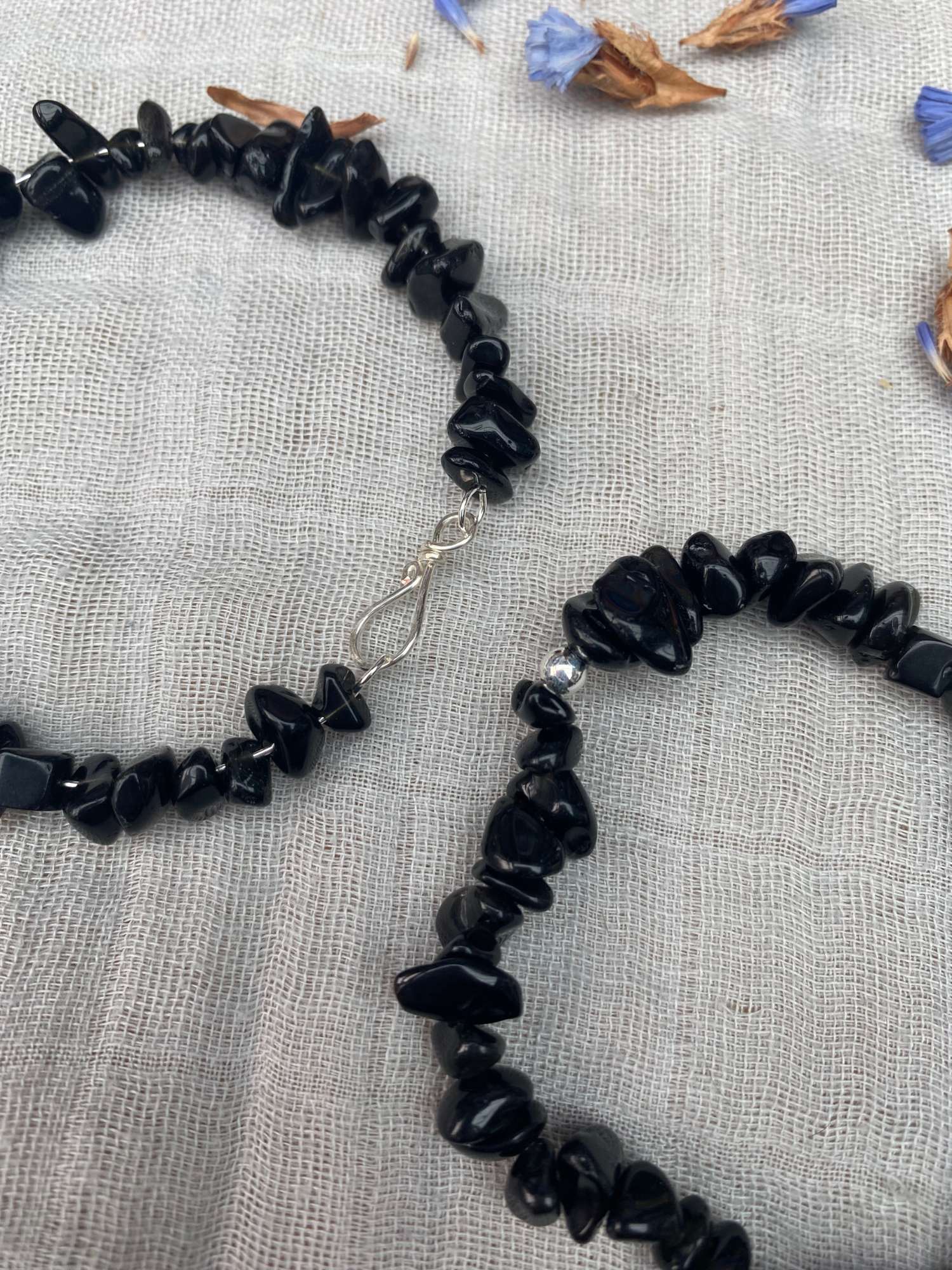 black obsidian bracelet one stretch cord one memory wire with silver handmade clasp close up