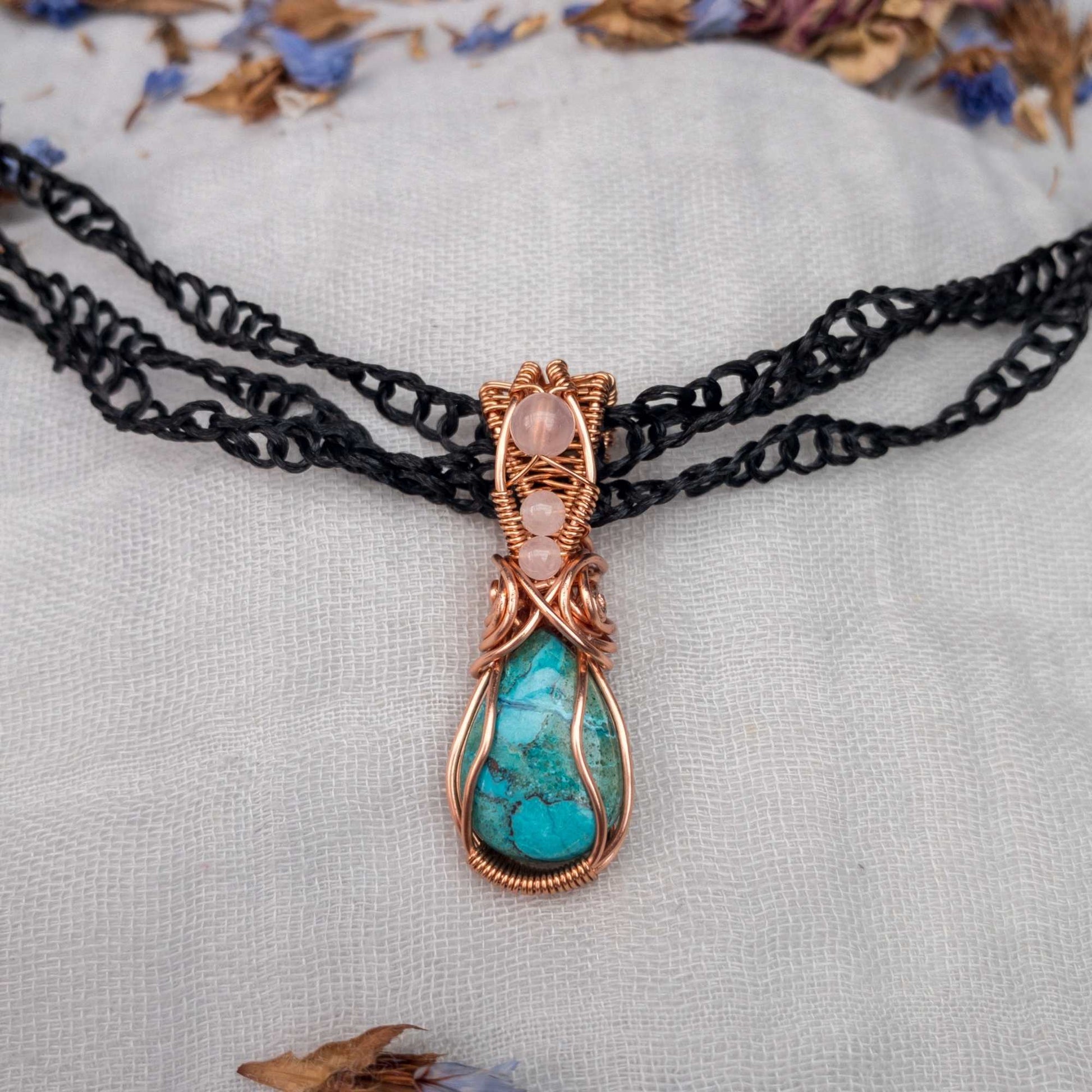 chrysocolla and rose quartz wire wrapped in copper pendant on a three strand hand crochet vegan silk necklace