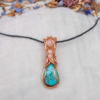 chrysocolla and rose quartz wire wrapped in copper pendant on an adjustable hemp cord necklace