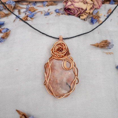 large sunstone wire wrapped in copper wire with rose wrap decal with handtied adjustable hemp cord