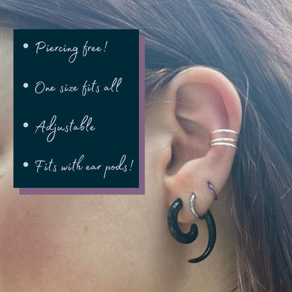 silver adjustable ear cuff shown on ear, with text: piercing free, one size fits all, adjustable, fits with ear pods